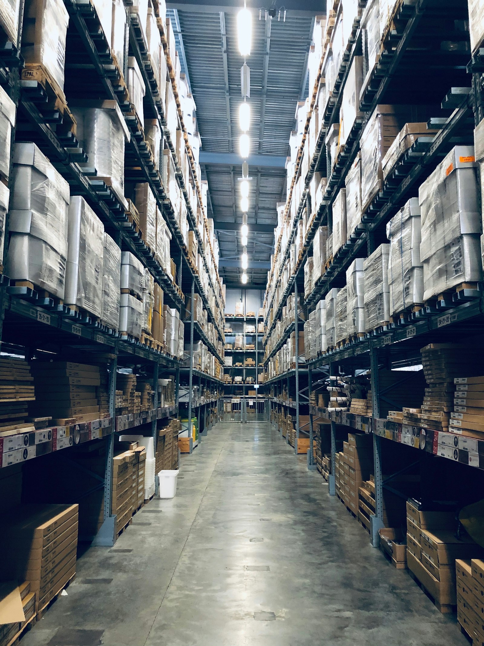 High-bay warehouse aisle with pallet racking